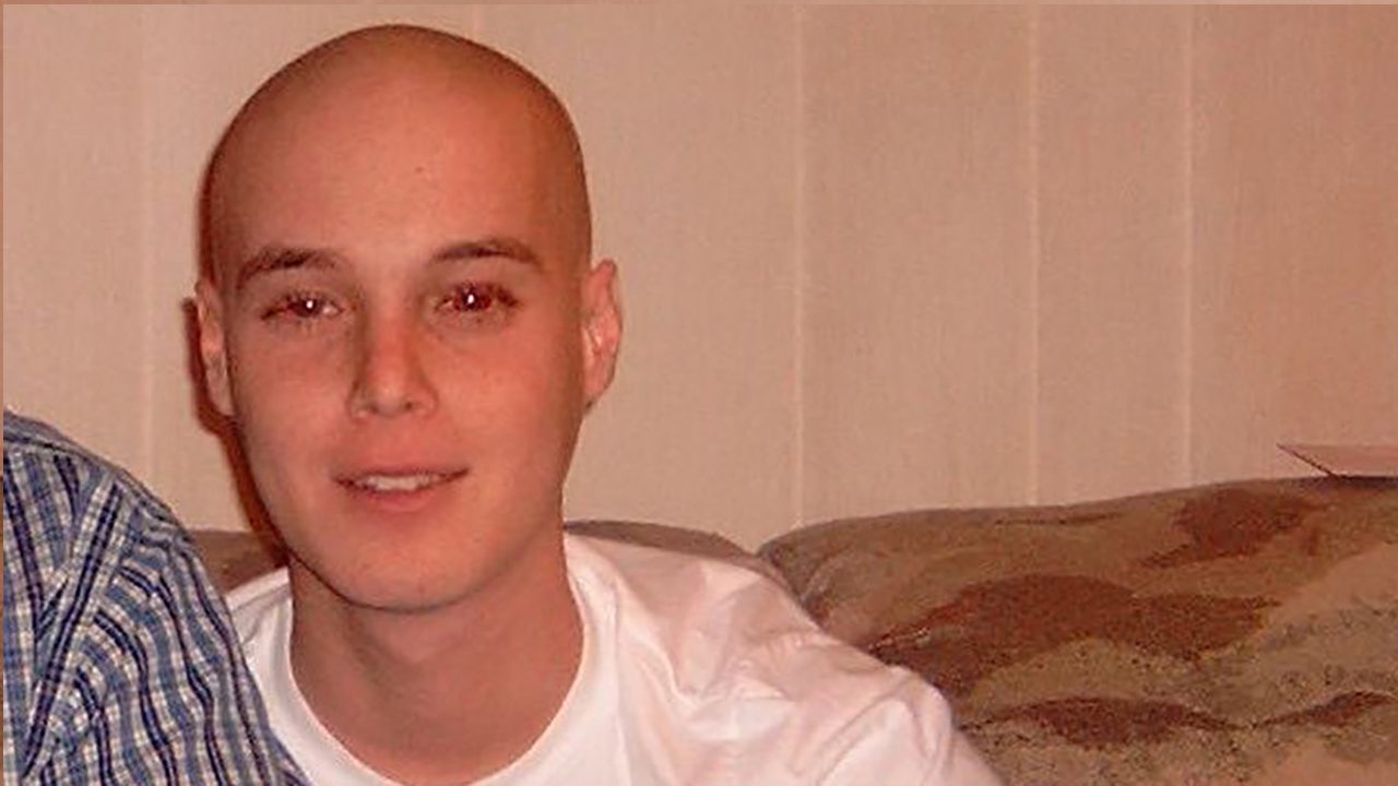 A smiling teen cancer patient