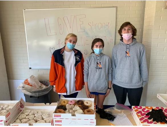 3 teens sell donuts at school