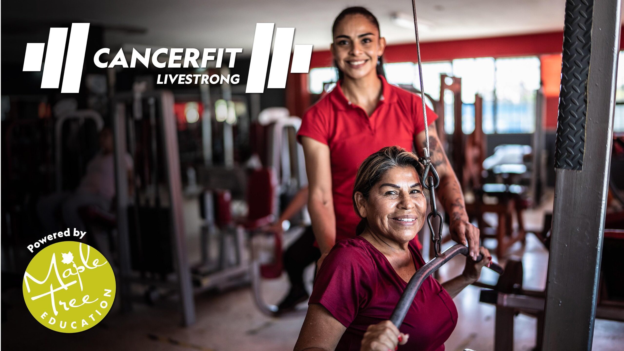 A young woman personal trainer assisting a middle aged woman with exercises in a gym