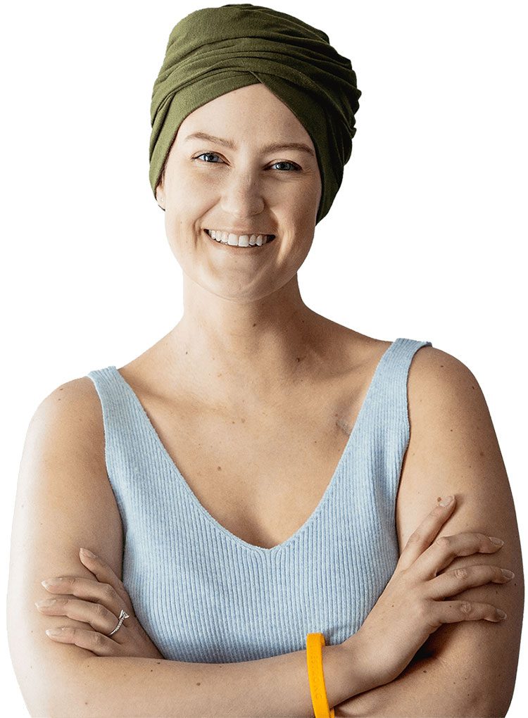 A smiling adult female cancer patient