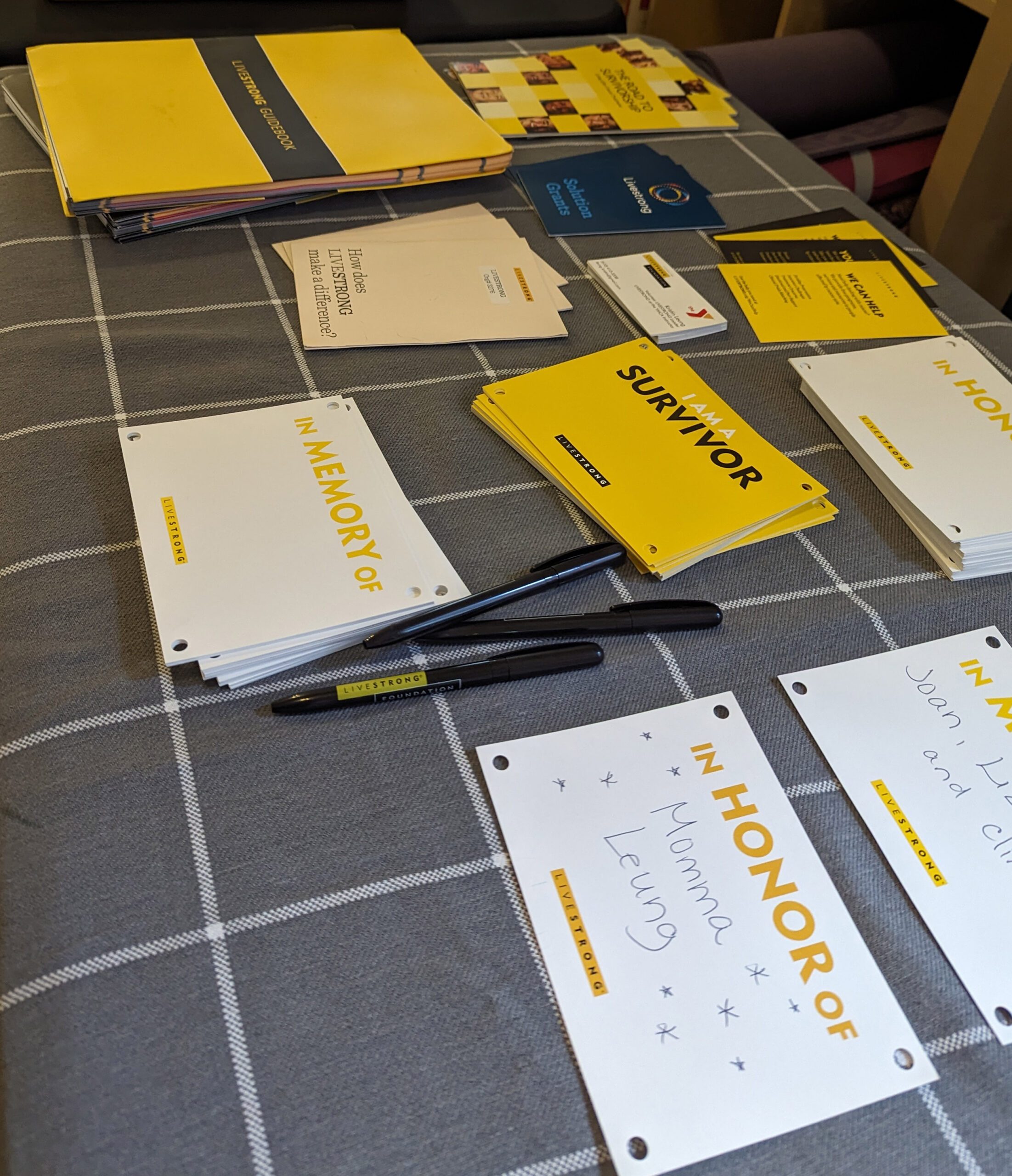 Papers and brochures laid out on a table