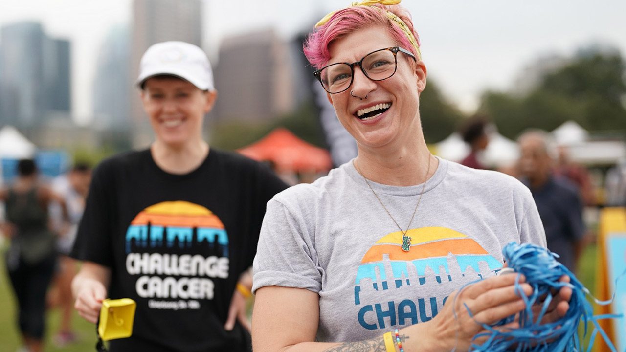 2 women cheering at a run