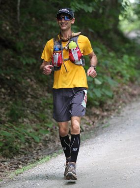 A man running on a trail