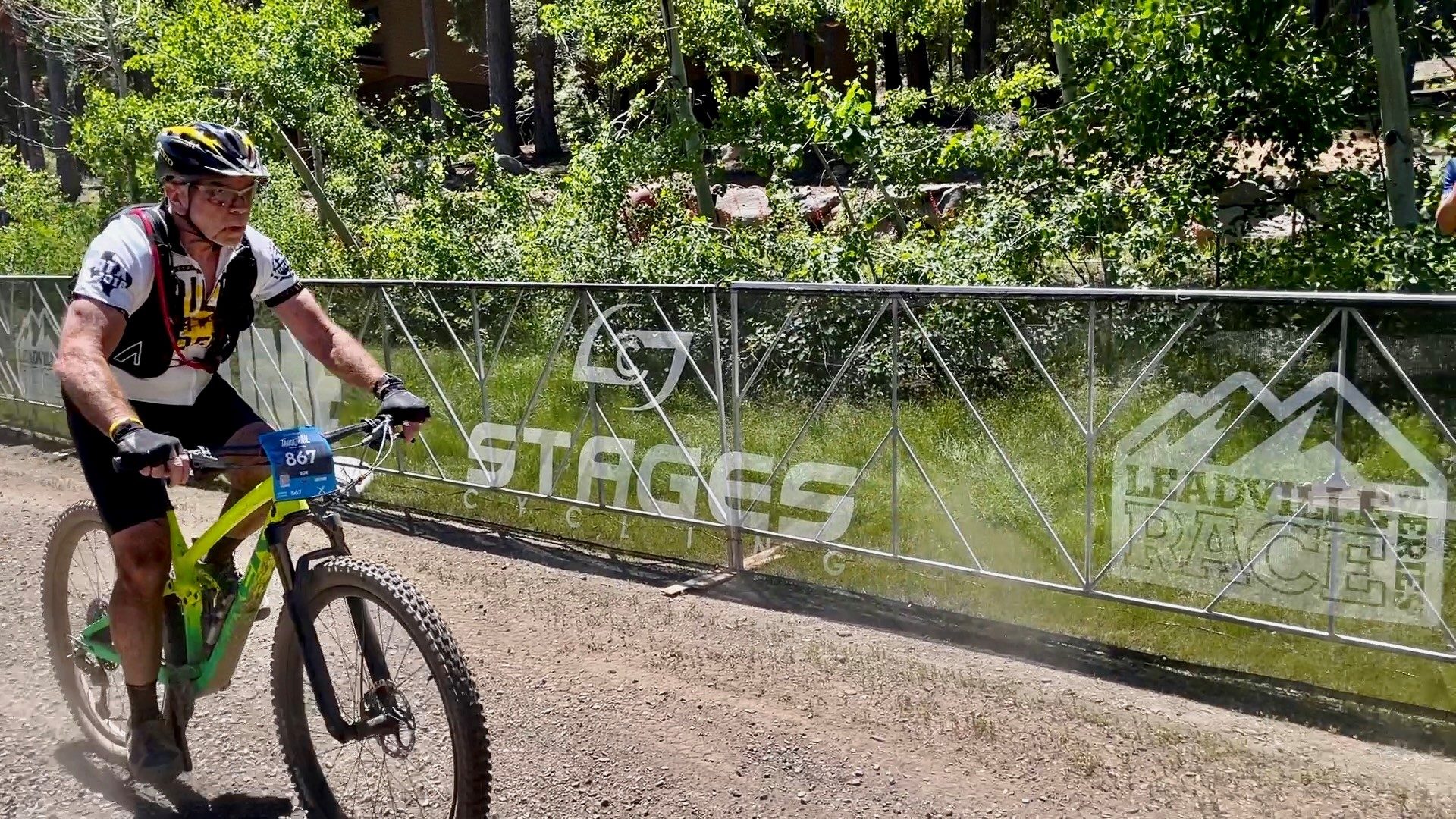 A man riding in a mountain bike race