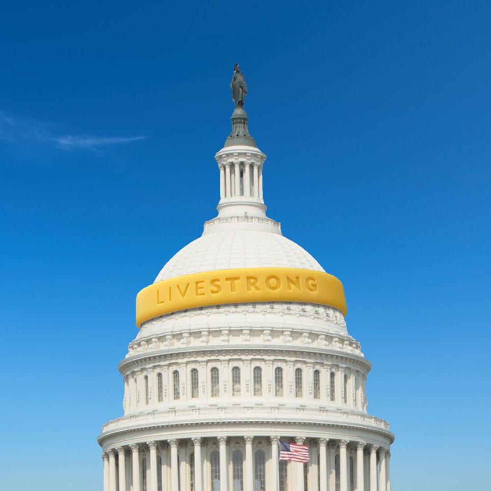 United States capitol building with a yellow wristband wrapped around it