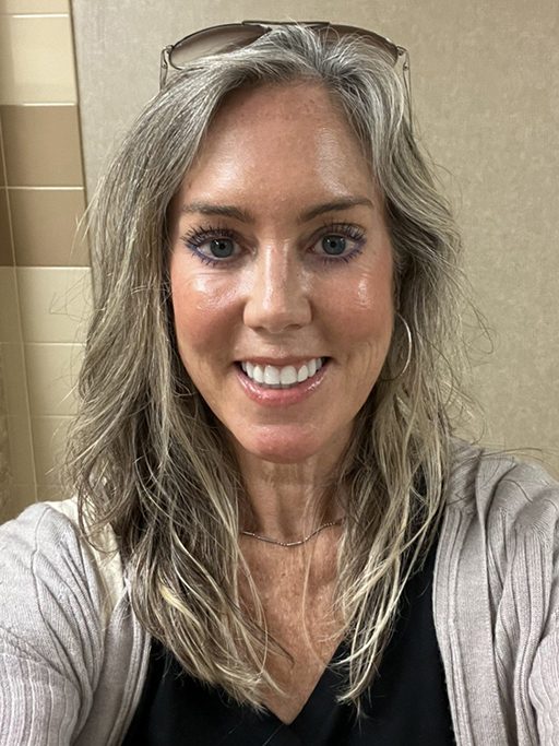 A selfie of a smiling adult woman