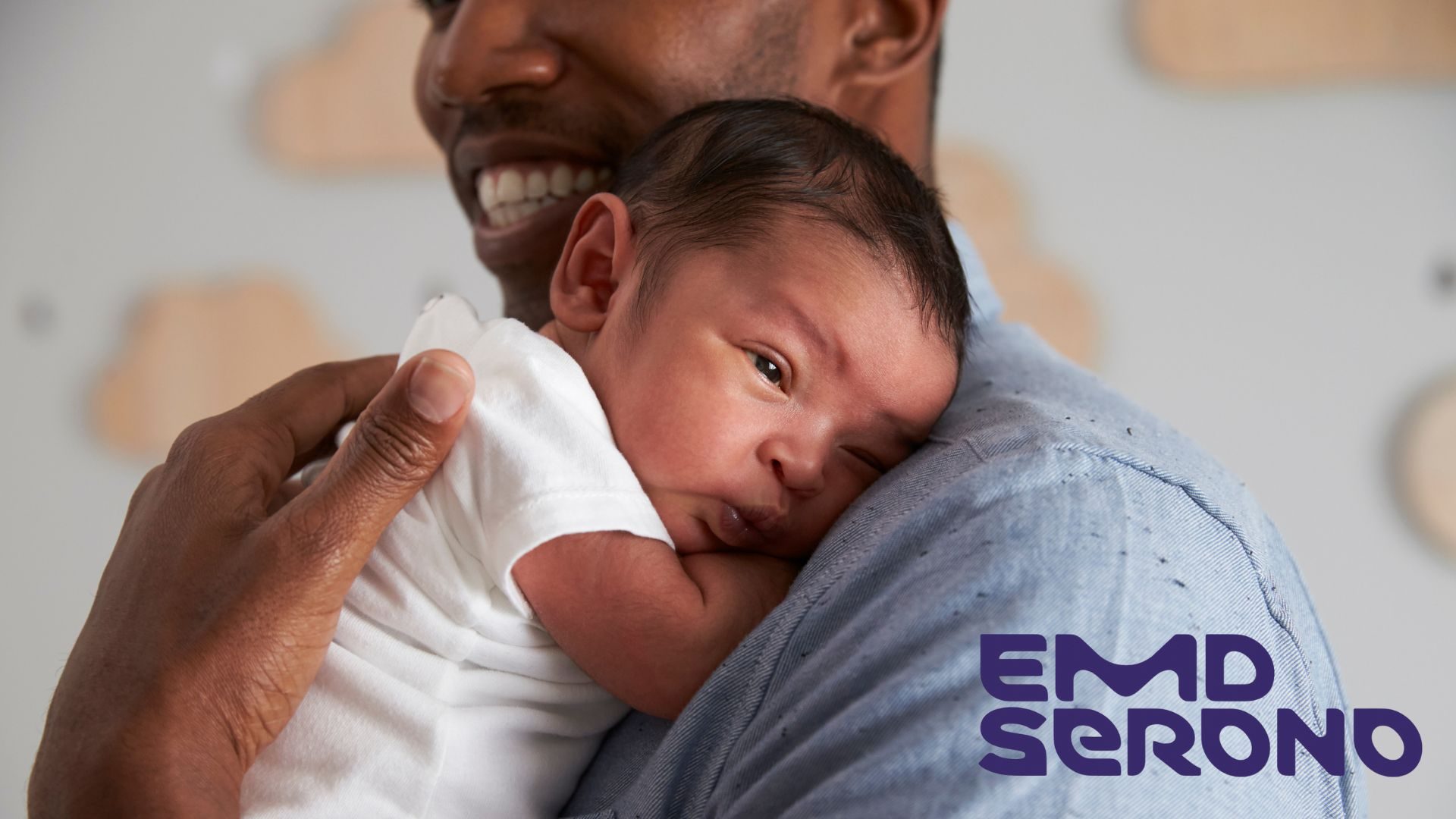 Father holding newborn baby
